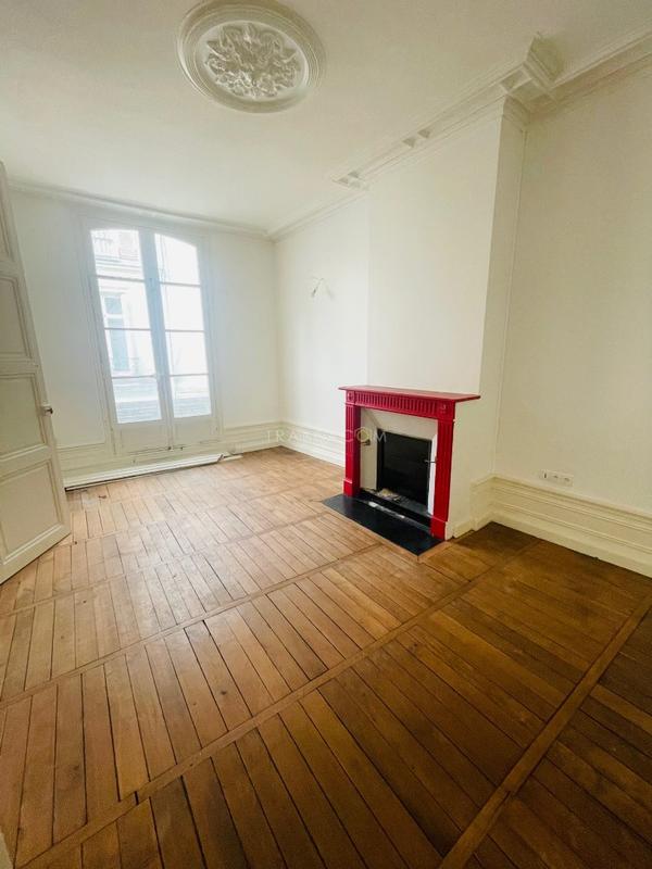 Appartement haussmannien - 101 m² - 4 pièces