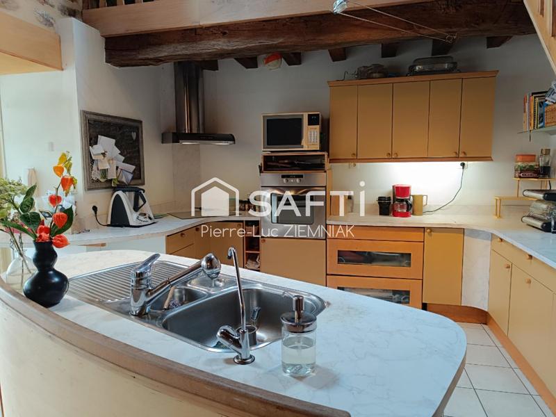 Maison - 204 m² - 7 pièces