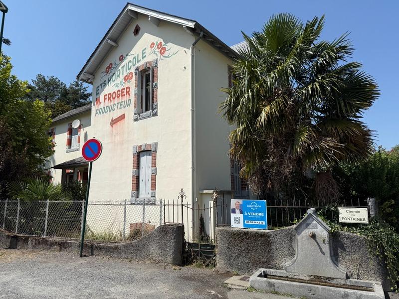 Maison - 185 m² - 10 pièces