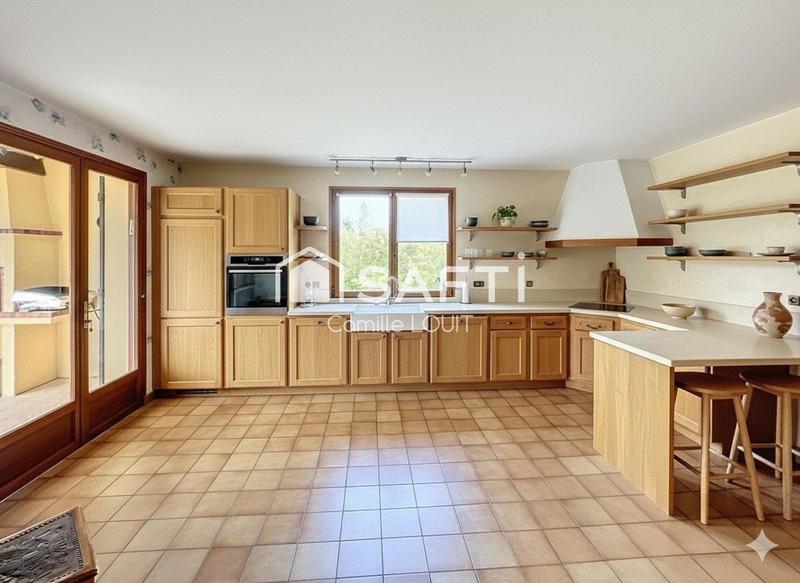 Maison - 217 m² - 8 pièces