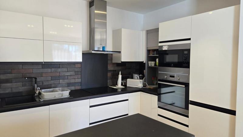 Maison - 106 m² - 5 pièces