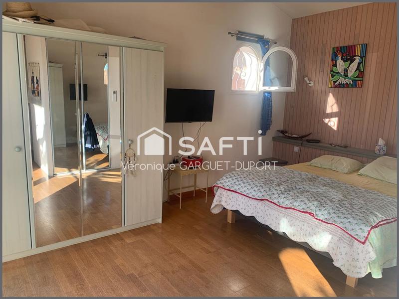 Maison - 218 m² - 8 pièces