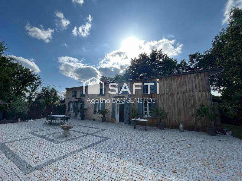 Maison - 200 m² - 8 pièces