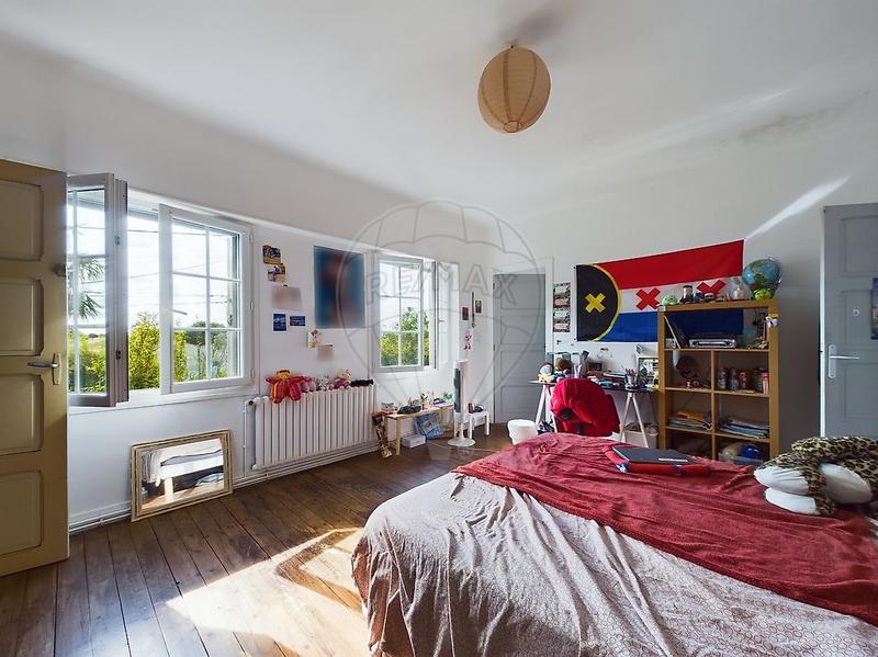 Maison - 200 m² - 7 pièces