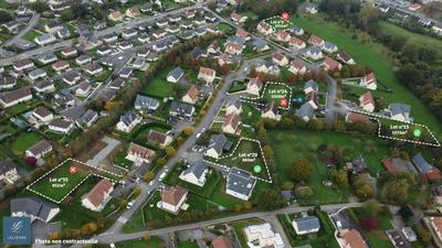 Terrain de lotissements - 1 016 m²