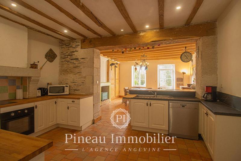 Maison - 303 m² - 13 pièces