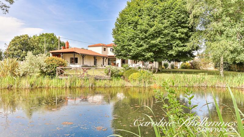 Maison - 218 m² - 8 pièces