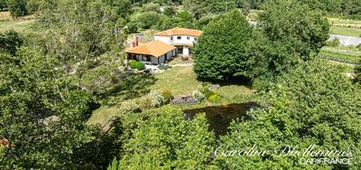 Maison - 218 m² - 8 pièces