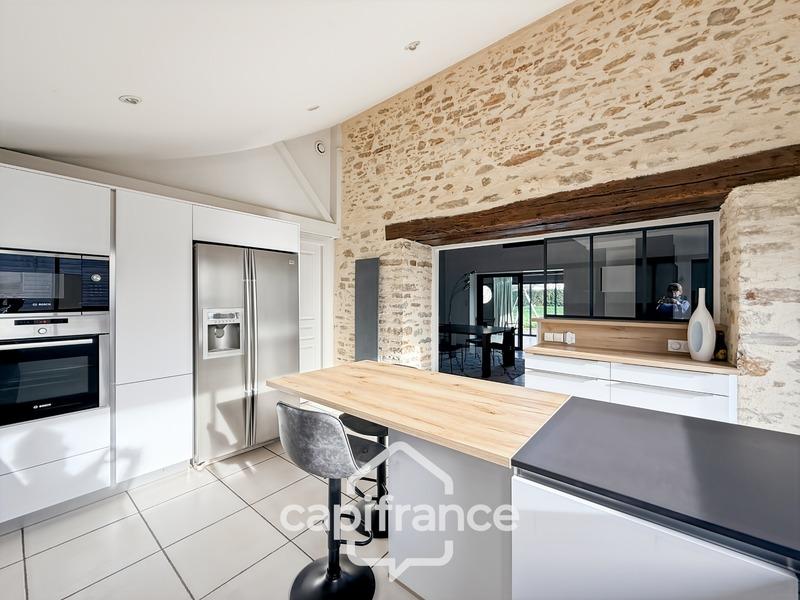 Maison - 298 m² - 10 pièces