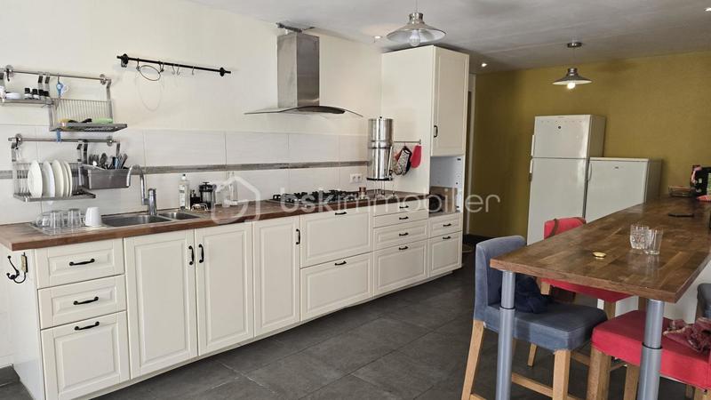 Maison - 400 m² - 16 pièces