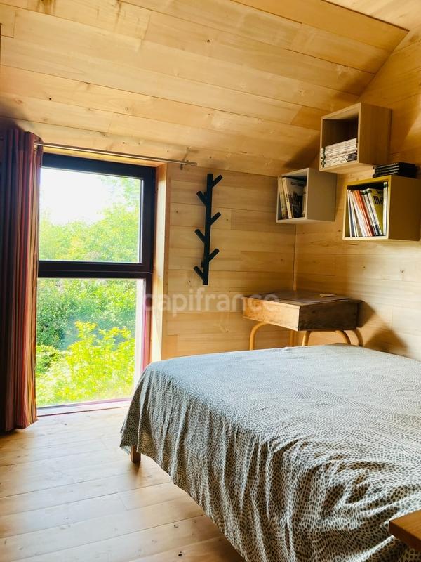 Maison de bois - 140 m² - 9 pièces