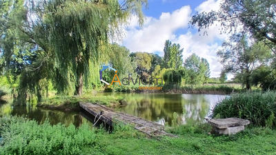 Maison - 240 m² - 7 pièces