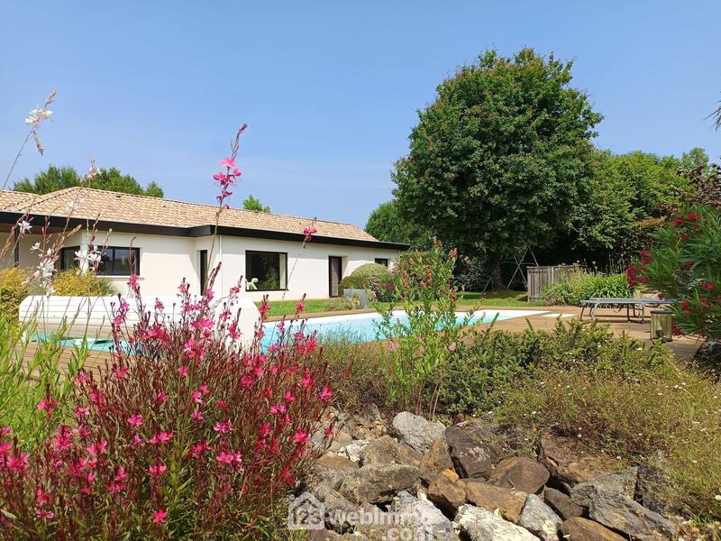 Maison - 180 m² - 7 pièces