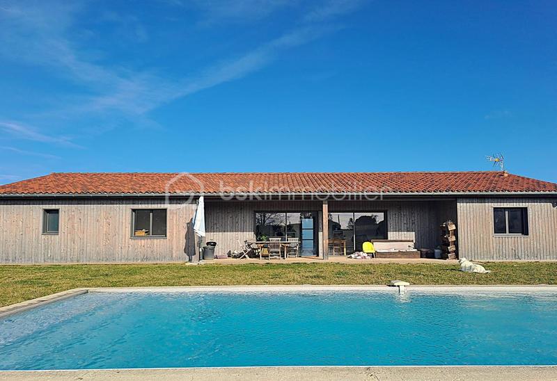 Maison de bois - 136 m² - 6 pièces