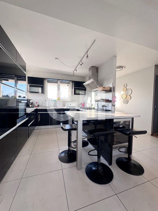 Maison - 140 m² - 6 pièces