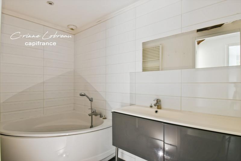 Appartement ancien - 97 m² - 3 pièces