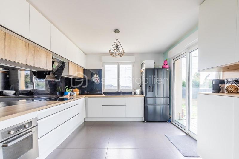 Maison - 94 m² - 5 pièces