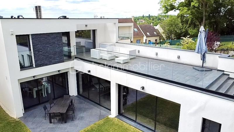 Maison d'architecte - 264 m² - 7 pièces