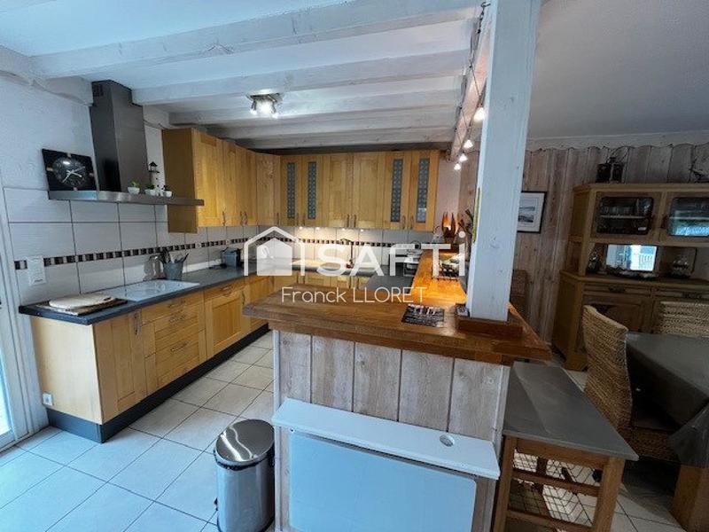 Maison - 111 m² - 9 pièces