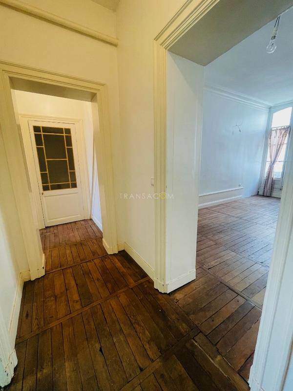 Appartement haussmannien - 101 m² - 4 pièces