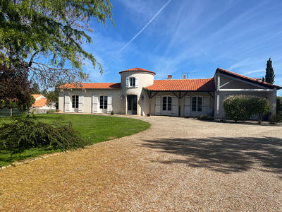 Maison - 210 m² - 7 pièces