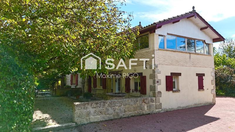 Maison - 247 m² - 9 pièces