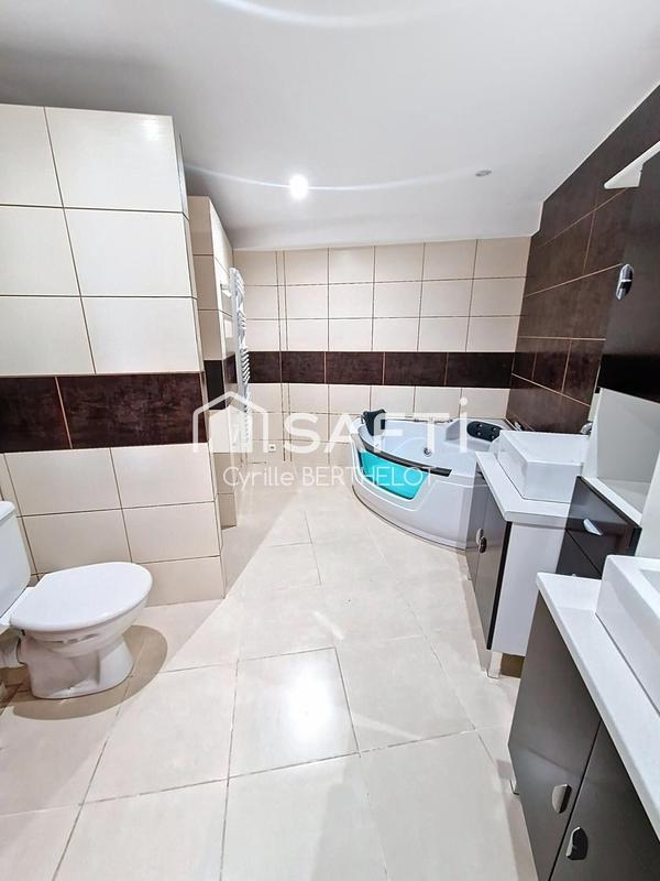 Maison - 219 m² - 9 pièces