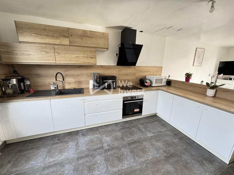 Maison - 95 m² - 5 pièces