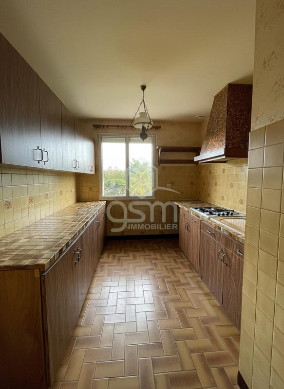 Maison traditionnelle - 111 m² - 5 pièces