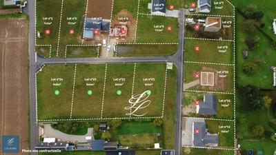 Terrain de lotissements - 703 m²