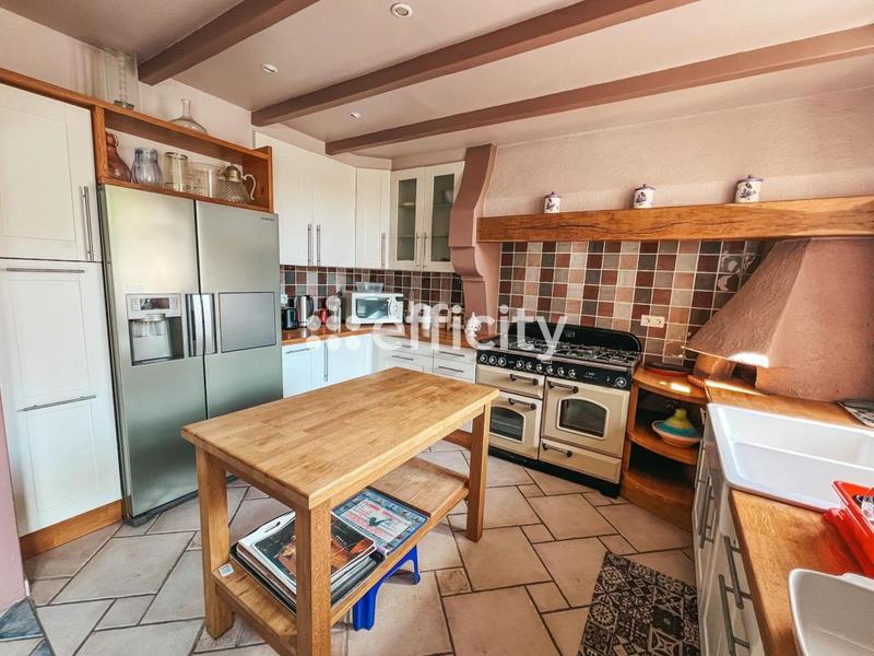 Maison - 345 m² - 10 pièces