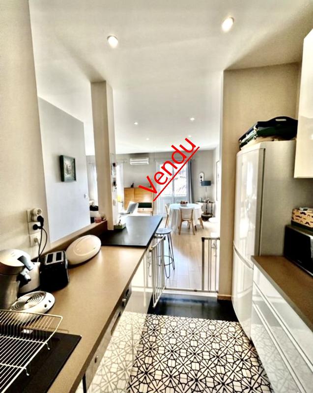 Appartement ancien - 77 m² - 3 pièces