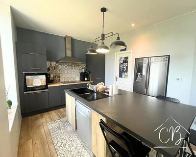 Maison - 99 m² - 5 pièces