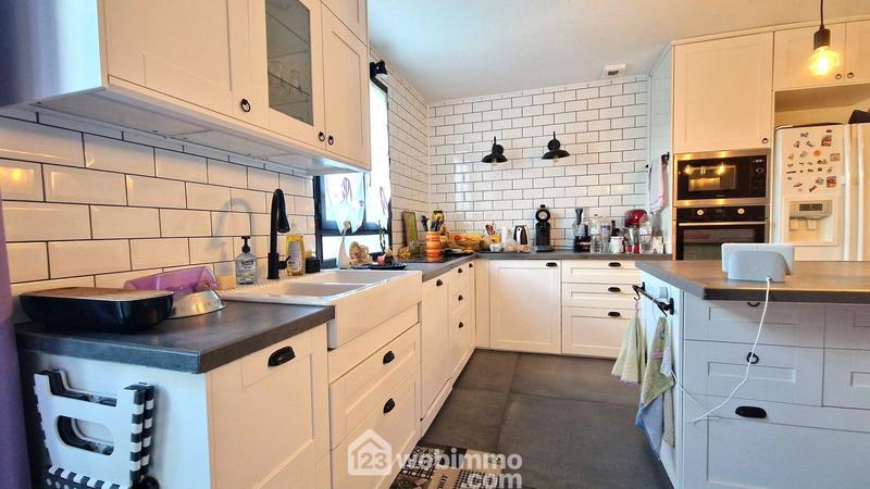 Maison - 112 m² - 5 pièces