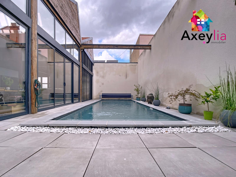 Maison - 240 m² - 7 pièces