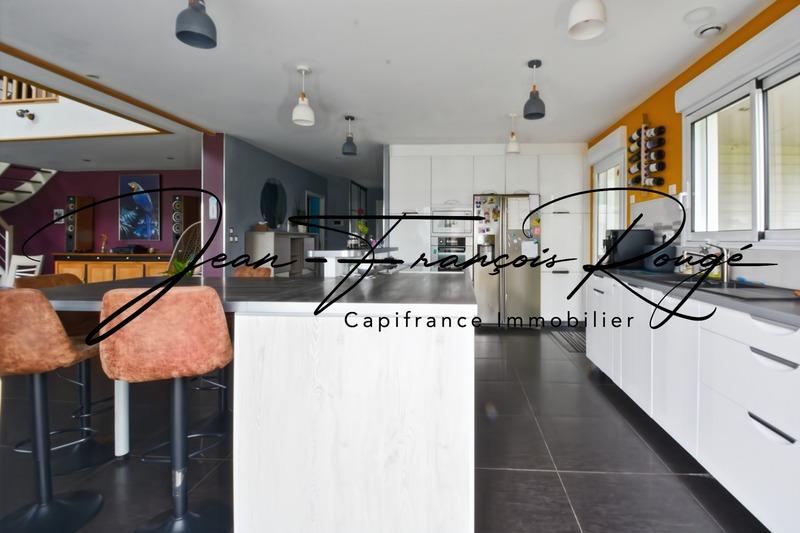 Maison - 200 m² - 7 pièces