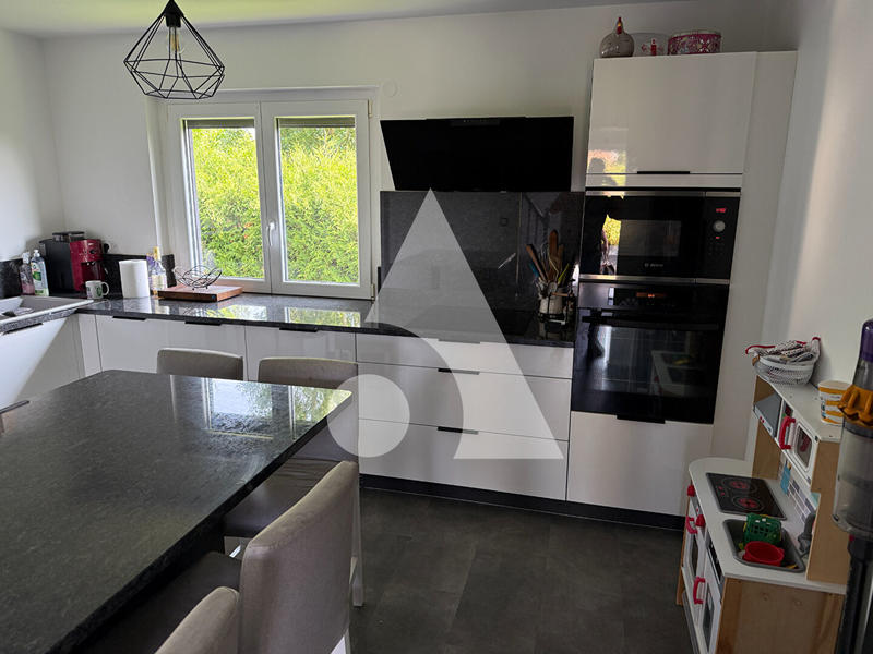 Maison - 104 m² - 5 pièces