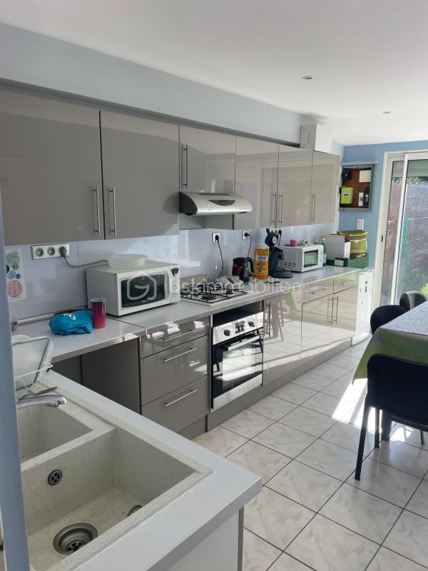 Maison - 94 m² - 5 pièces