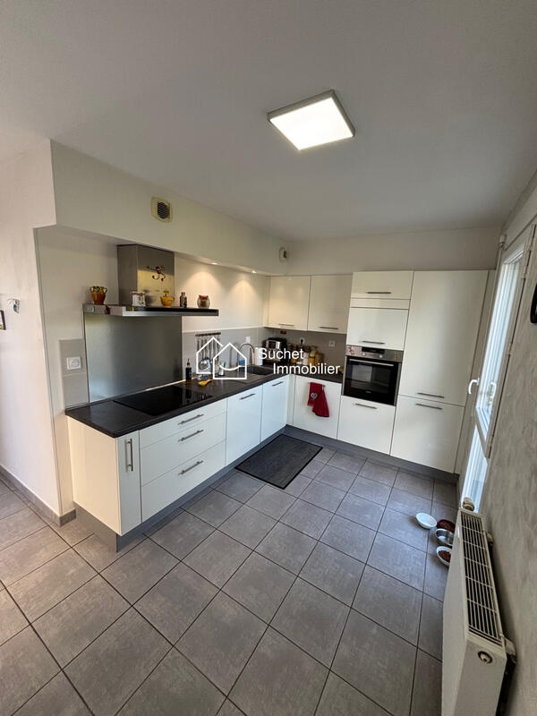 Maison - 101 m² - 5 pièces