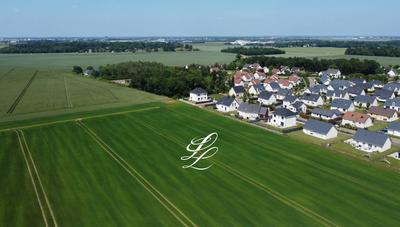 Terrain de lotissements - 605 m²