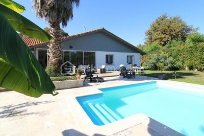 Maison - 238 m² - 7 pièces