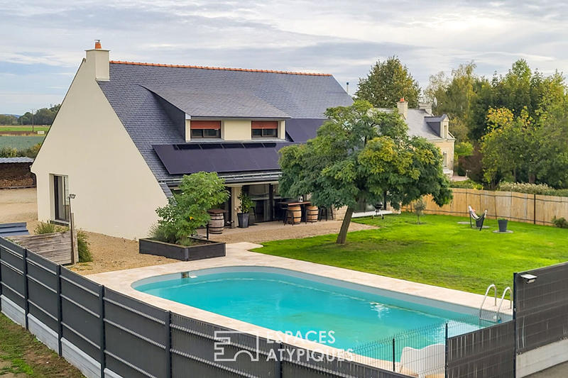 Maison - 185 m² - 7 pièces