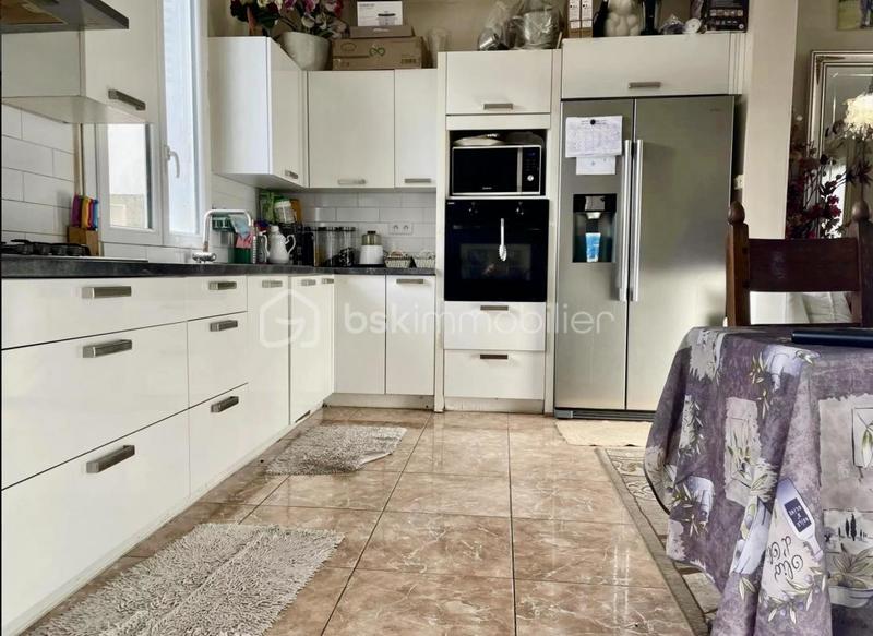 Maison - 100 m² - 5 pièces