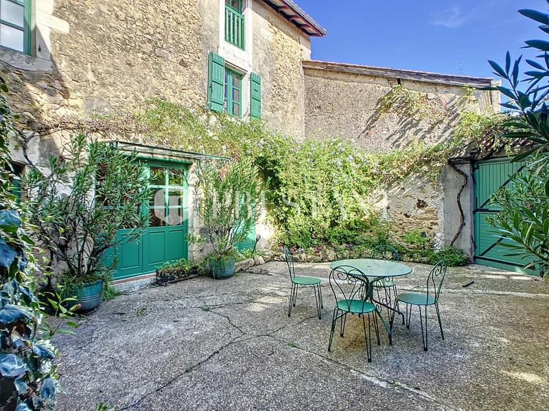 Maison - 424 m² - 14 pièces