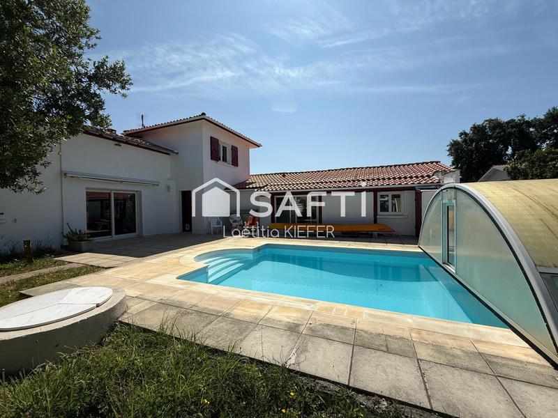 Maison - 198 m² - 10 pièces