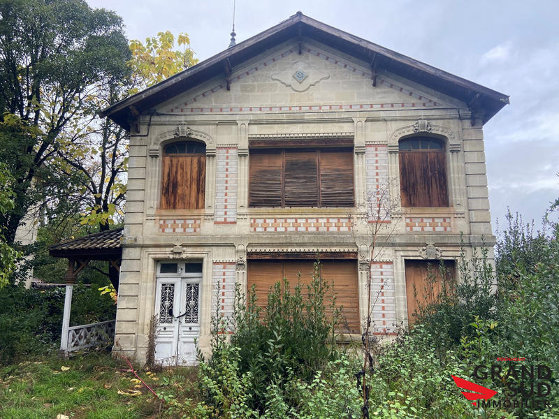 Maison - 200 m² - 12 pièces