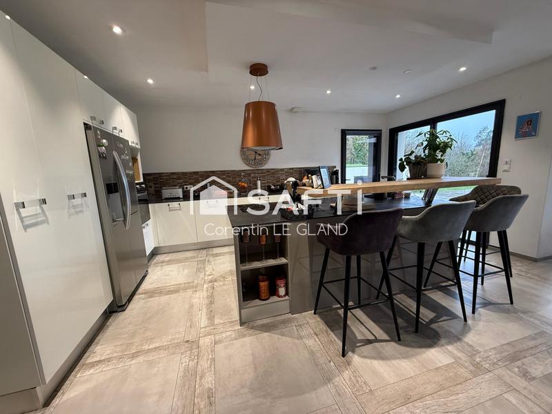 Maison - 200 m² - 7 pièces