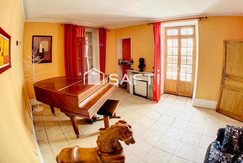 Maison - 305 m² - 12 pièces