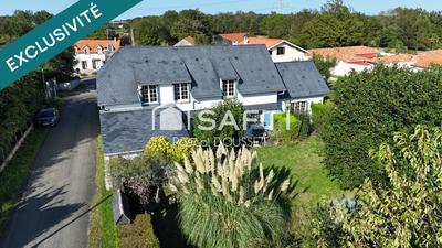 Maison - 200 m² - 7 pièces