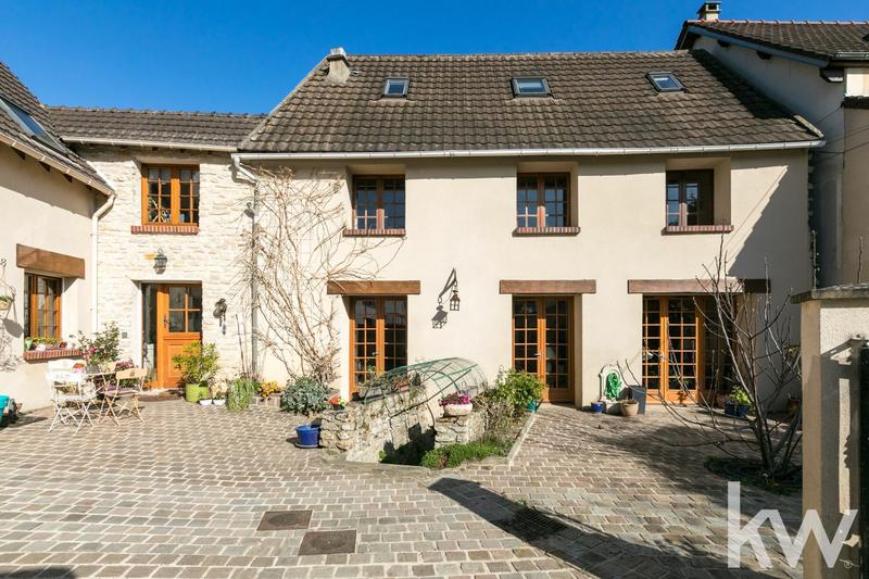 Maison - 210 m² - 7 pièces